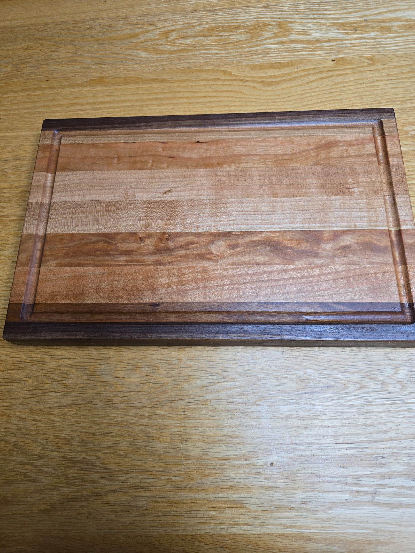 Walnut And Cherry edge grain cutting board