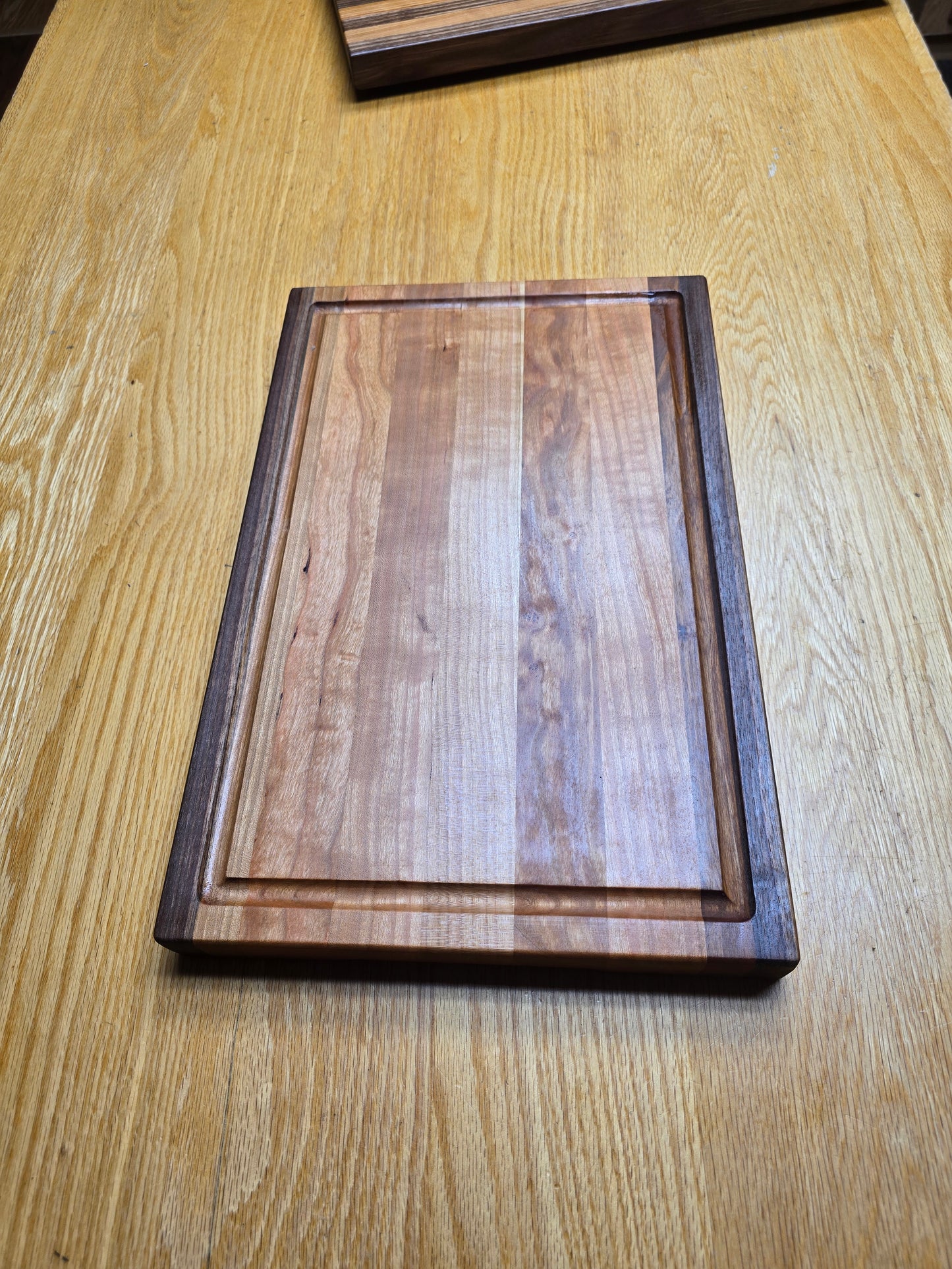 Walnut And Cherry edge grain cutting board