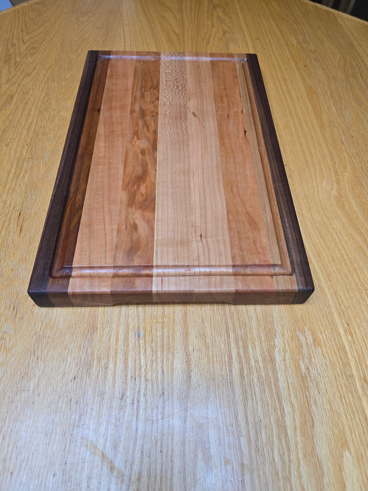 Walnut And Cherry edge grain cutting board