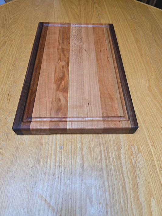 Walnut And Cherry edge grain cutting board